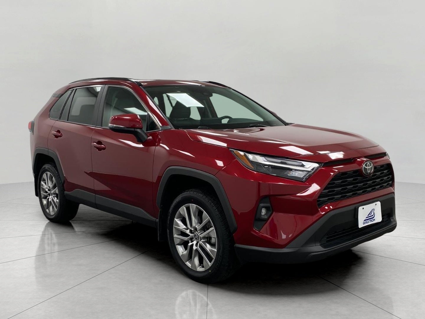 2022 Toyota RAV4 XLE Premium AWD in Ruby Flare Pearl — front three-quarter view