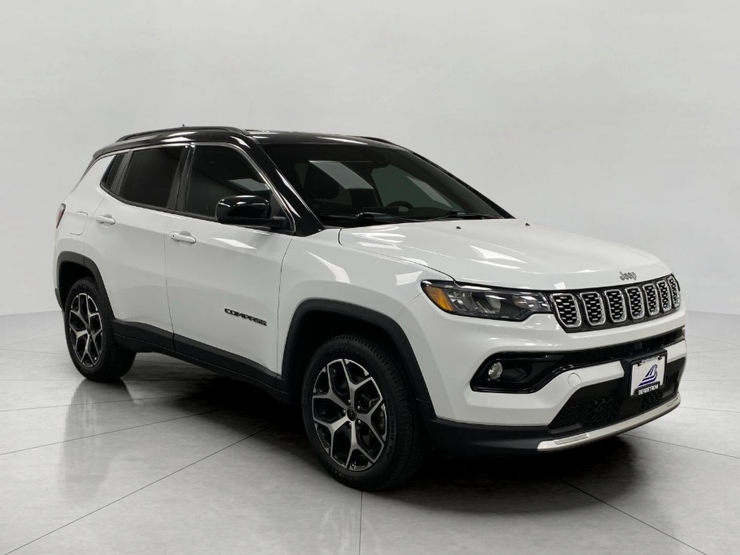2025 Jeep Compass Limited 4x4 in Bright White Clearcoat — front three-quarter view