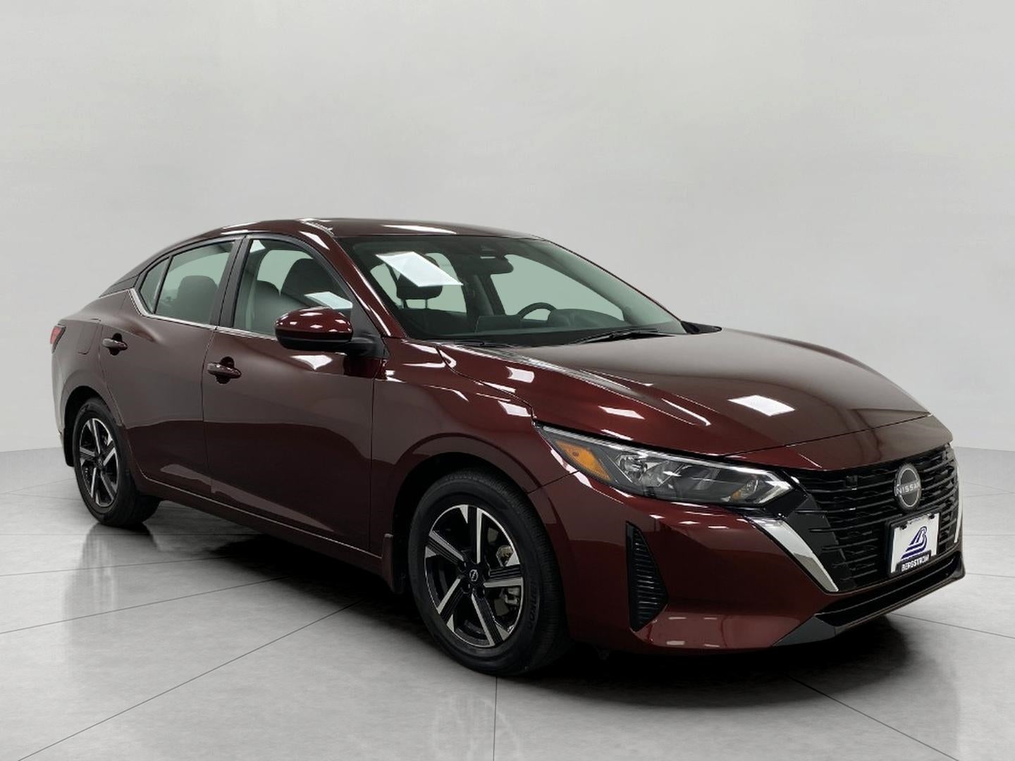 2025 Nissan Sentra SV CVT in Rosewood Metallic — front three-quarter view