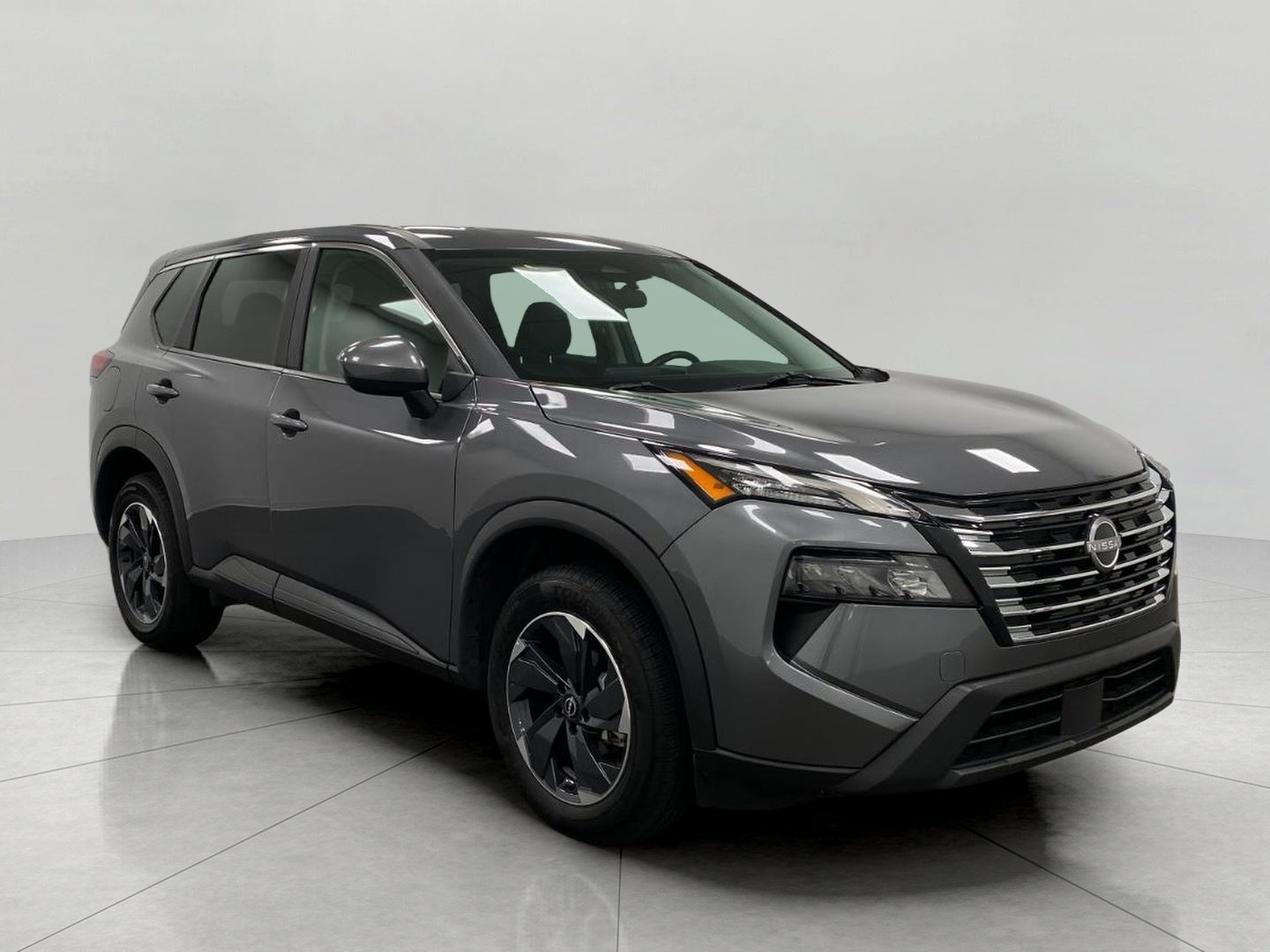 2025 Nissan Rogue AWD SV in Gun Metallic — front three-quarter view
