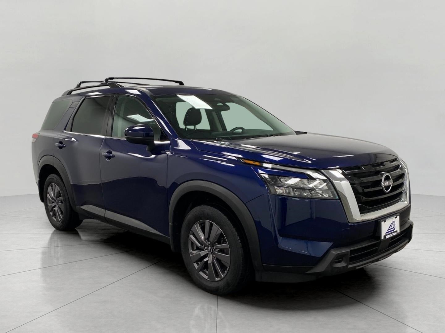 2023 Nissan Pathfinder SV 4WD in Deep Ocean Blue — front three-quarter view