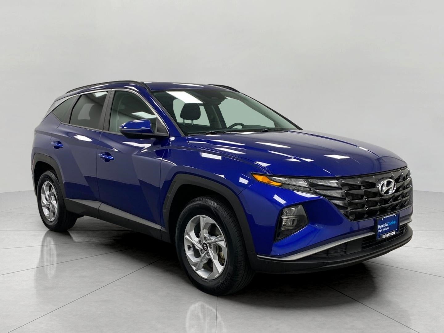 2023 Hyundai Tucson SEL AWD in Intense Blue — front three-quarter view