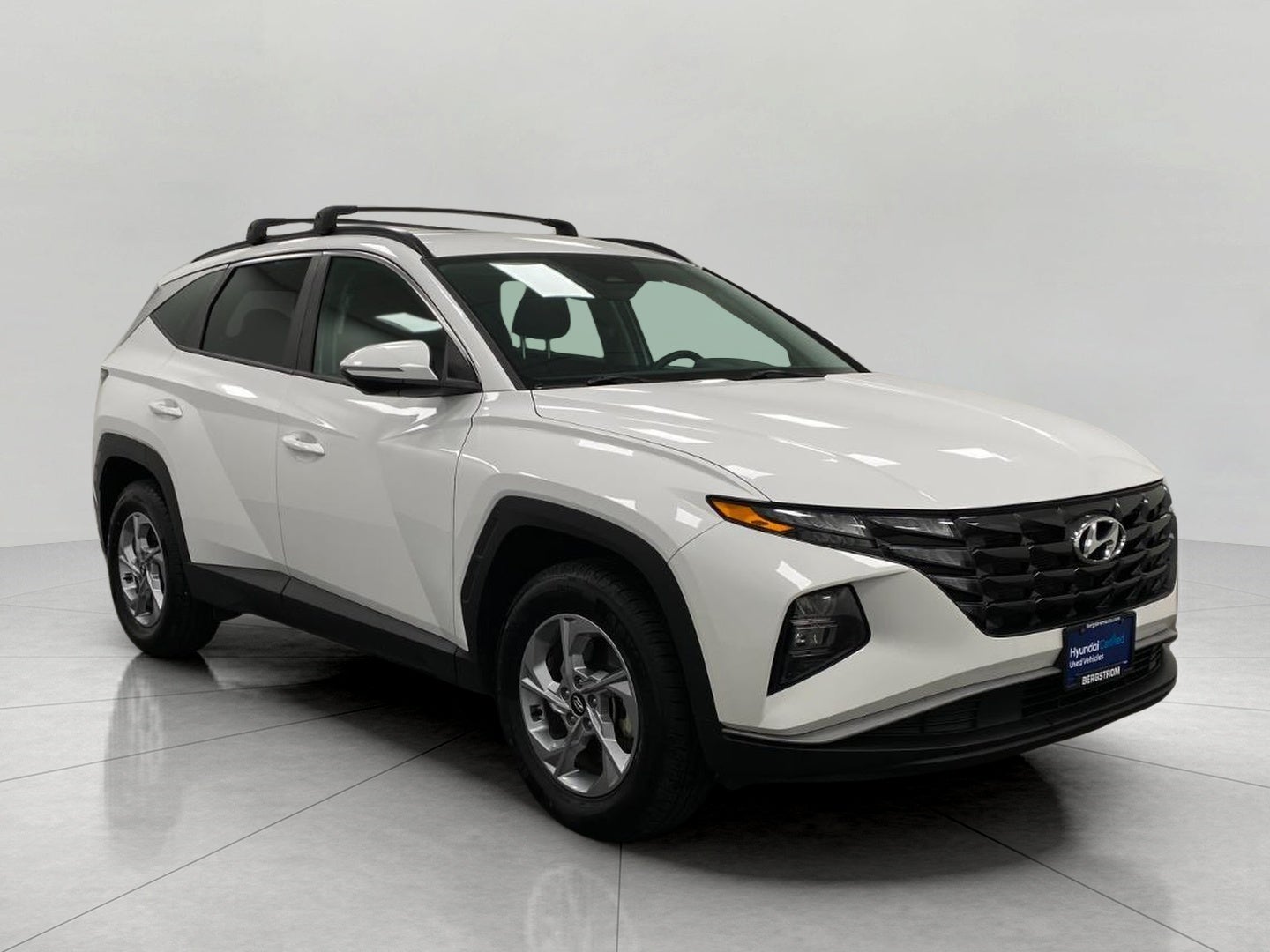 2023 Hyundai Tucson SEL AWD in Serenity White Pearl — front three-quarter view
