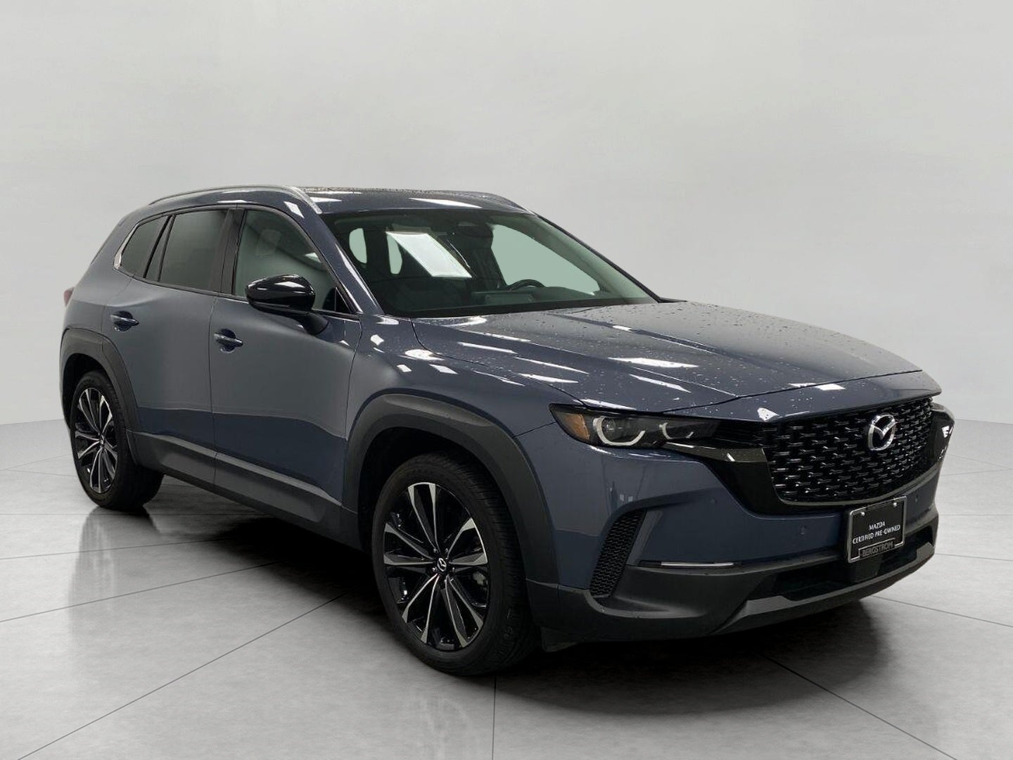 2026 Mazda Mazda CX-50 2.5 S Premium AWD in Polymetal Gray Metallic — front three-quarter view