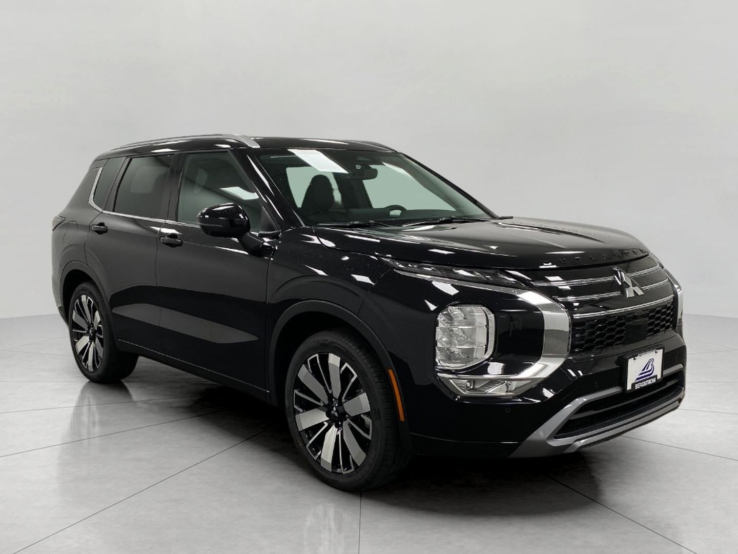 2026 Mitsubishi Outlander SEL S-AWC in Labrador Black Pearl — front three-quarter view