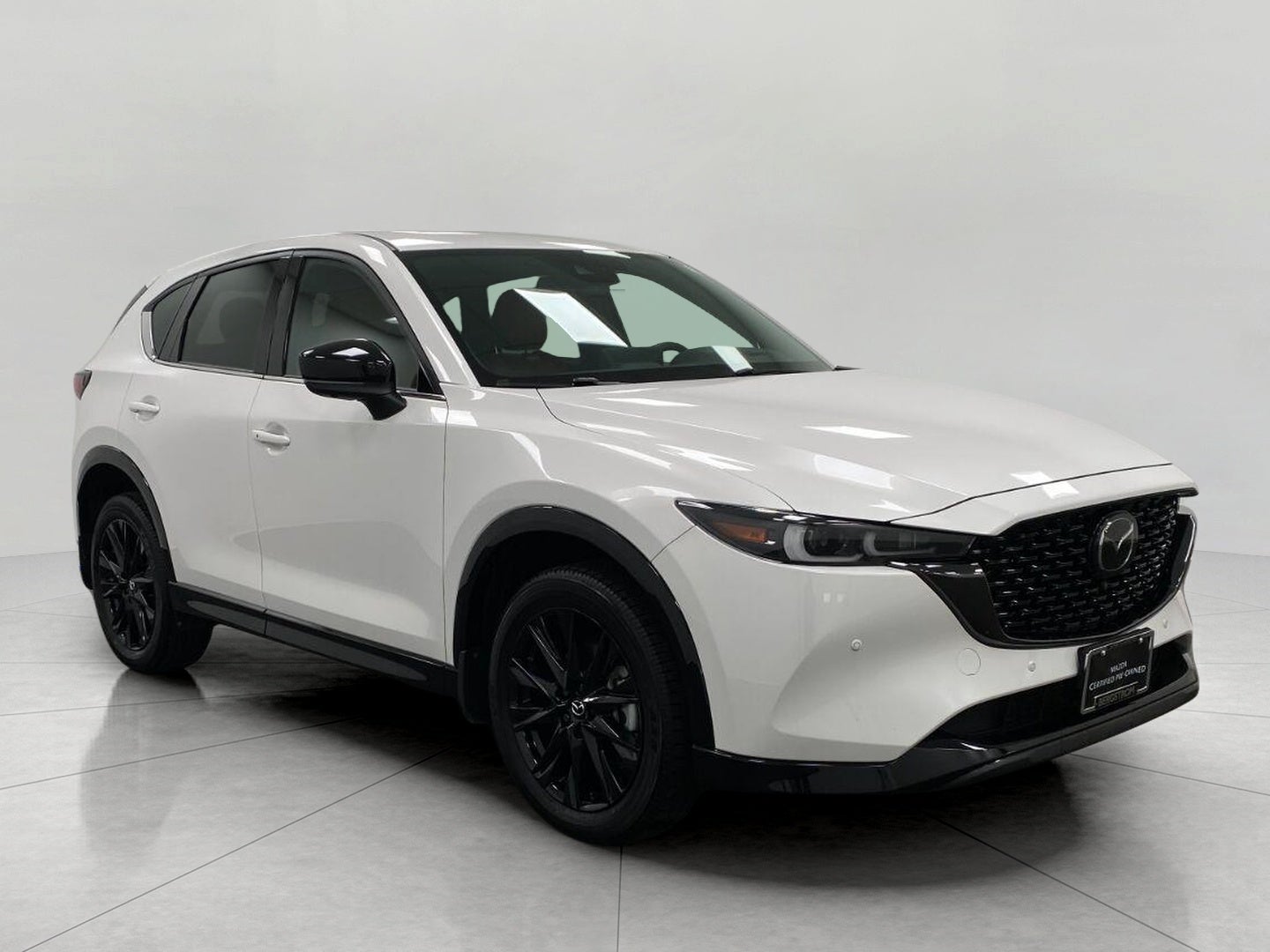 2025 Mazda Mazda CX-5 2.5 Carbon Turbo AWD in Rhodium White Metallic — front three-quarter view
