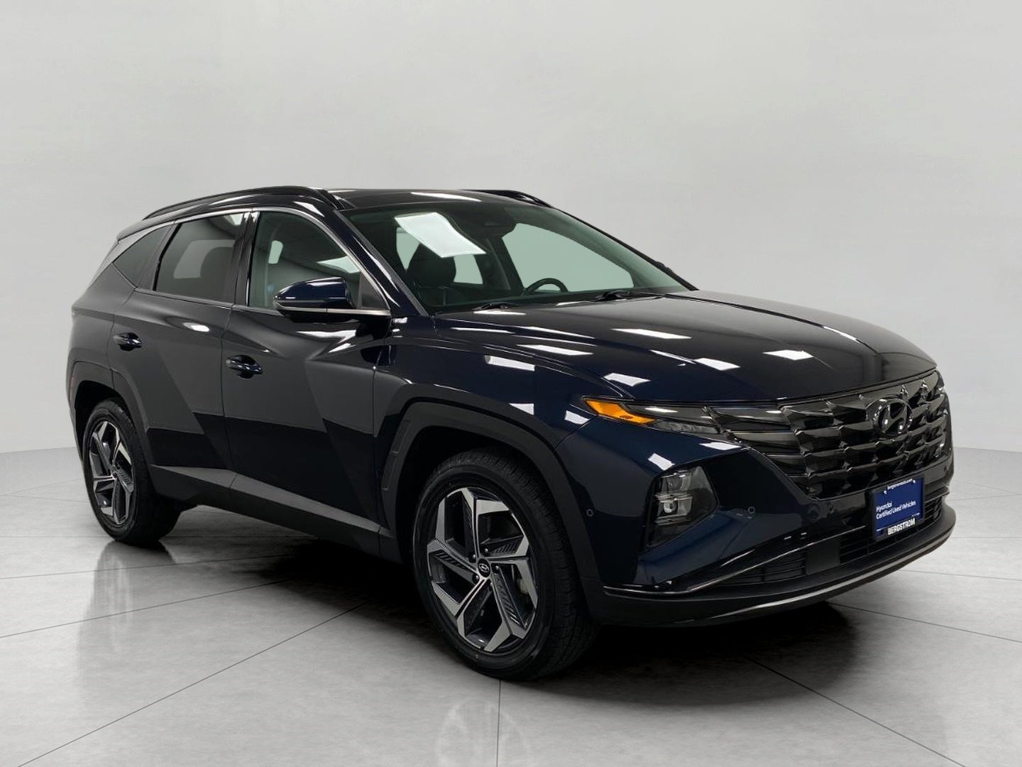 2022 Hyundai Tucson Hybrid Limited AWD in Deep Sea — front three-quarter view